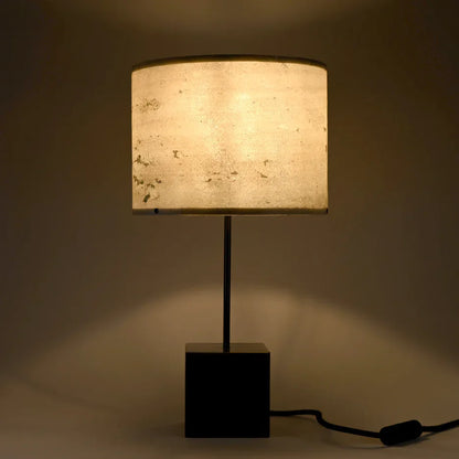 Lampe Képler Halo patine cuivre et mica vert dans un intérieur moderne